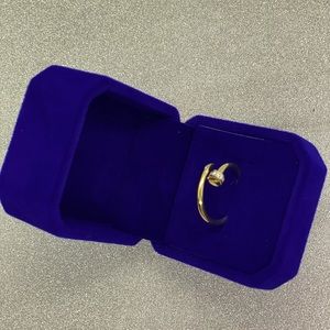 Inspired nail ring in 18k gold.